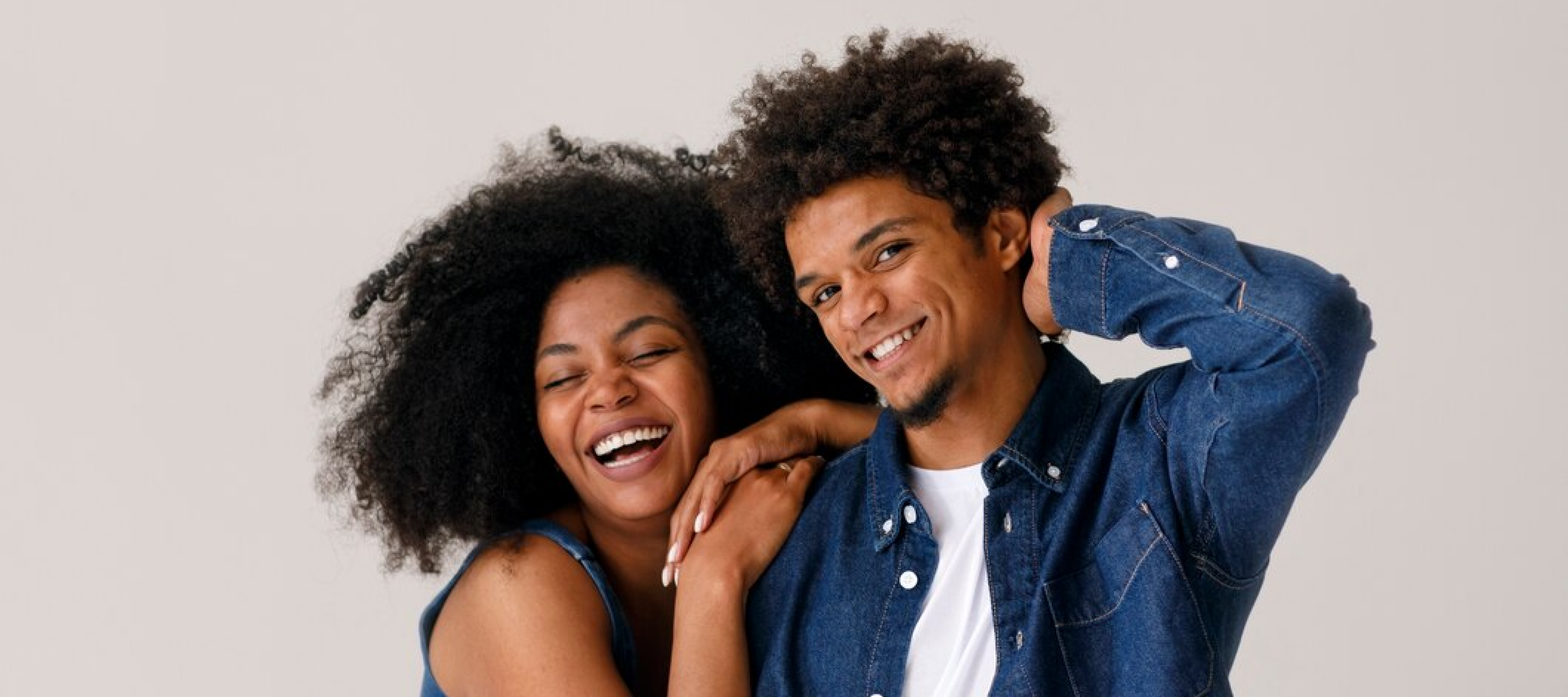 Image of a couple with afro hairstyles